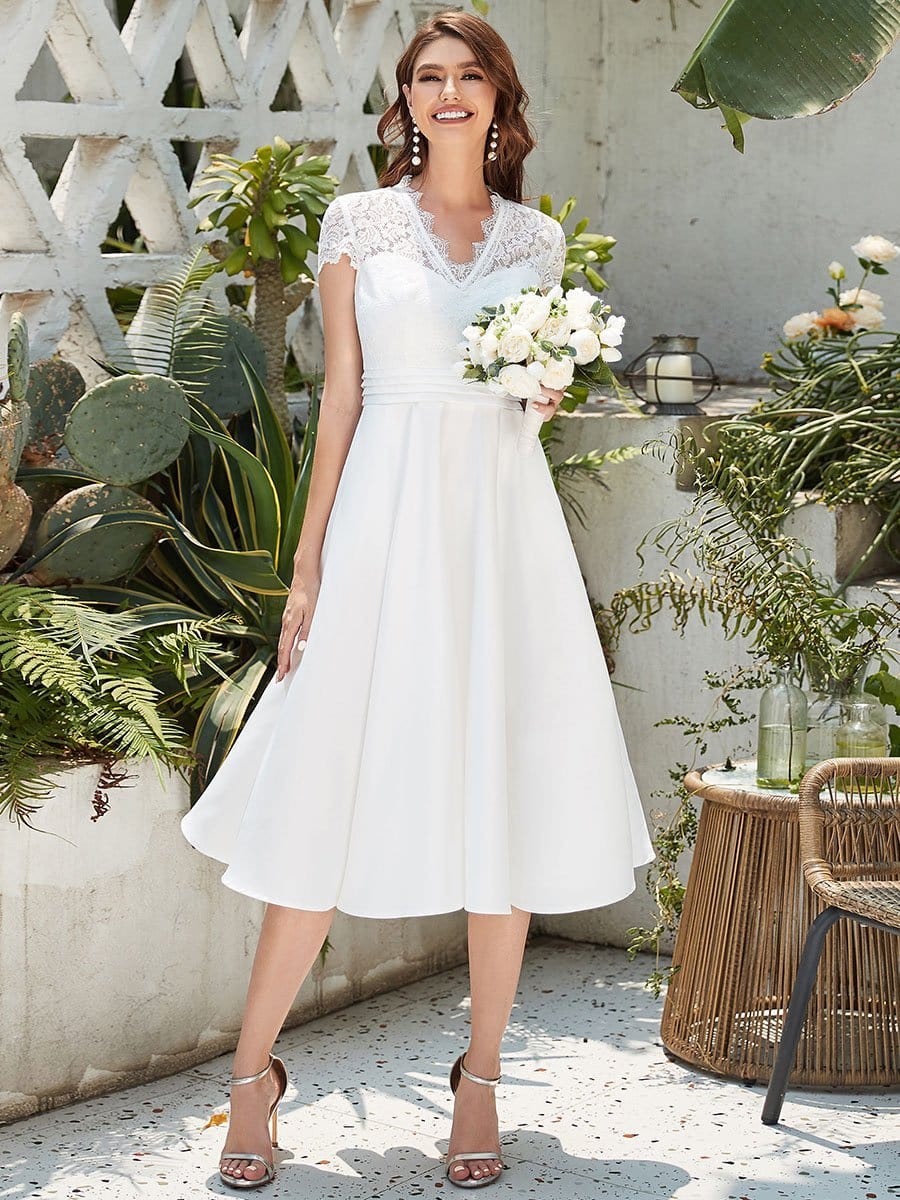 Elegantes Midi-Abendkleid mit V-Ausschnitt und gestickter Blume und kurzen Ärmeln 40400 #farbe_weiss